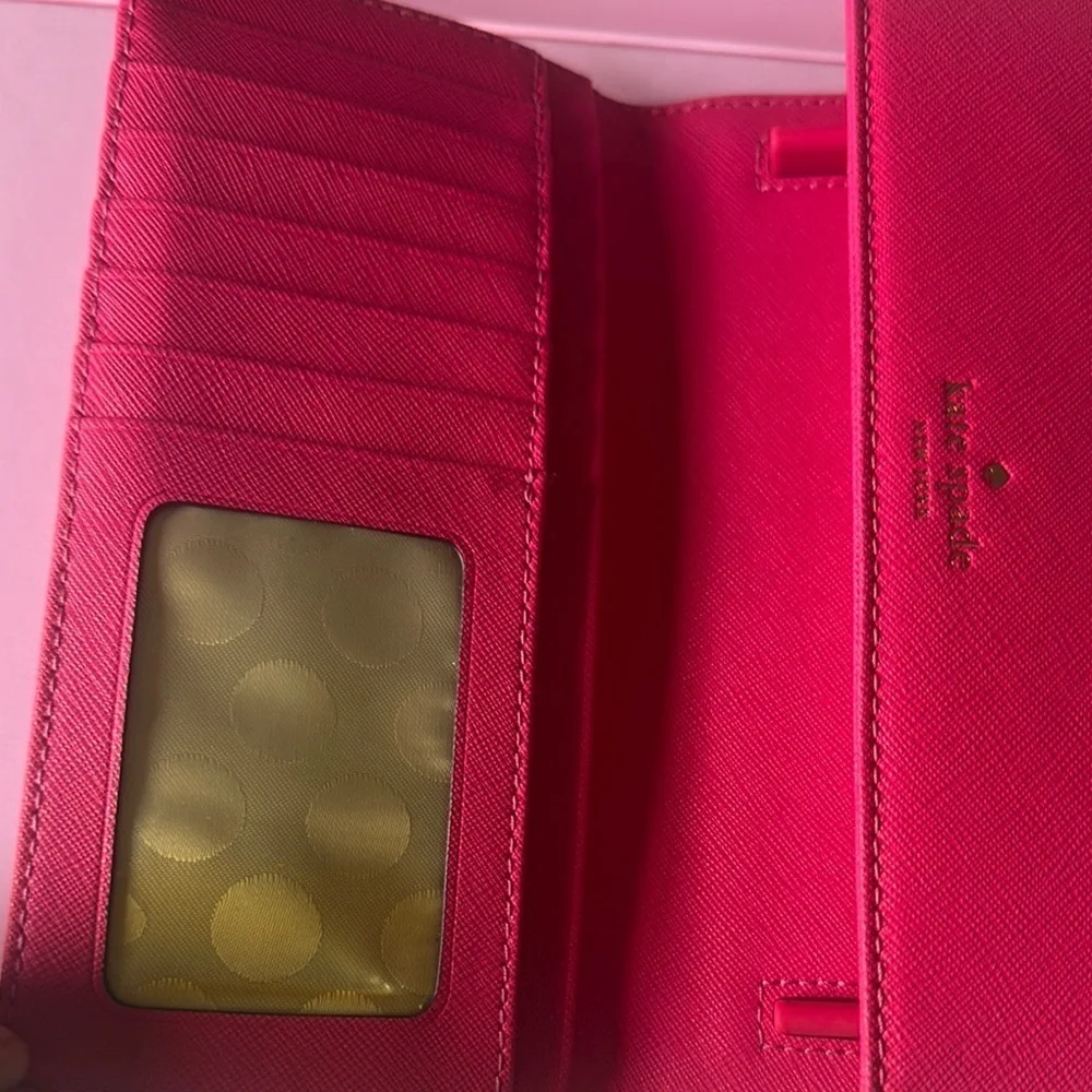 Kate Spade Pink Wallet Sleek Fold-Over Design (Inside plastic is stained)
